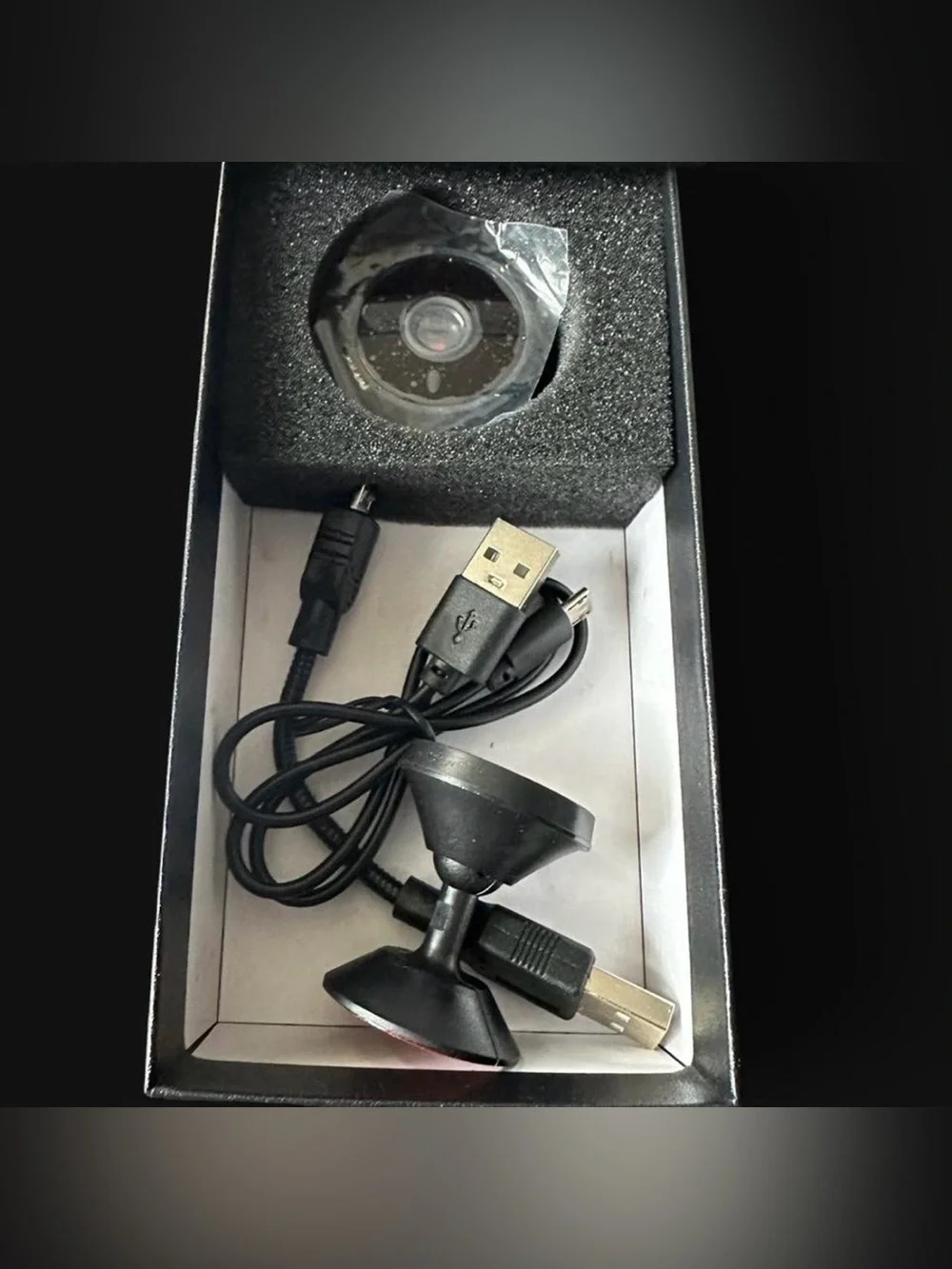 Compact Black WiFi Security Camera with USB Cable